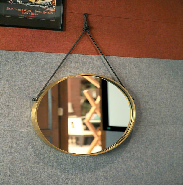 Alluring gold and black round wall mirror