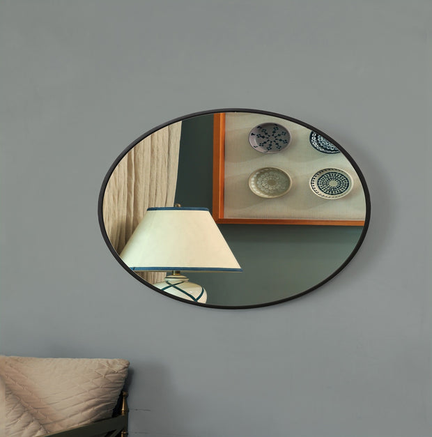 Modest black oval shaped wall mirror