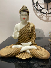 Skillfully handcrafted white and golden Gautam Buddha idol