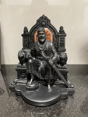 Custom-made dexterous full black Shivaji Maharaj idol