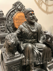 Custom-made dexterous full black Shivaji Maharaj idol