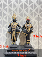 Competently handcrafted black and golden god Vitthal Rukmini idol