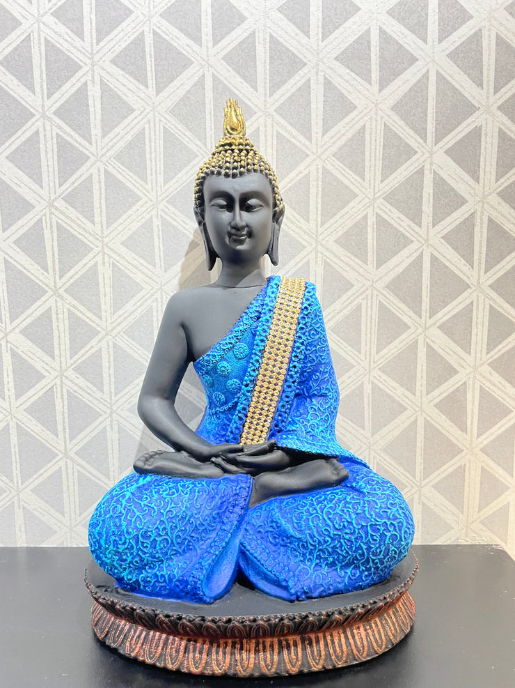 Intricately designed multi colored Gautam Buddha idol