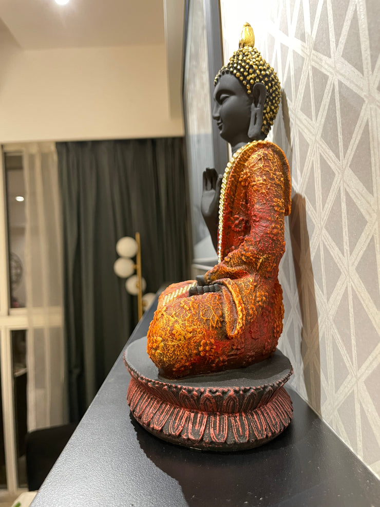 Intricately designed multi colored Gautam Buddha idol