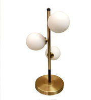 COSMOS WHITE AND ANTIQUE BRASS TABLE LAMP
